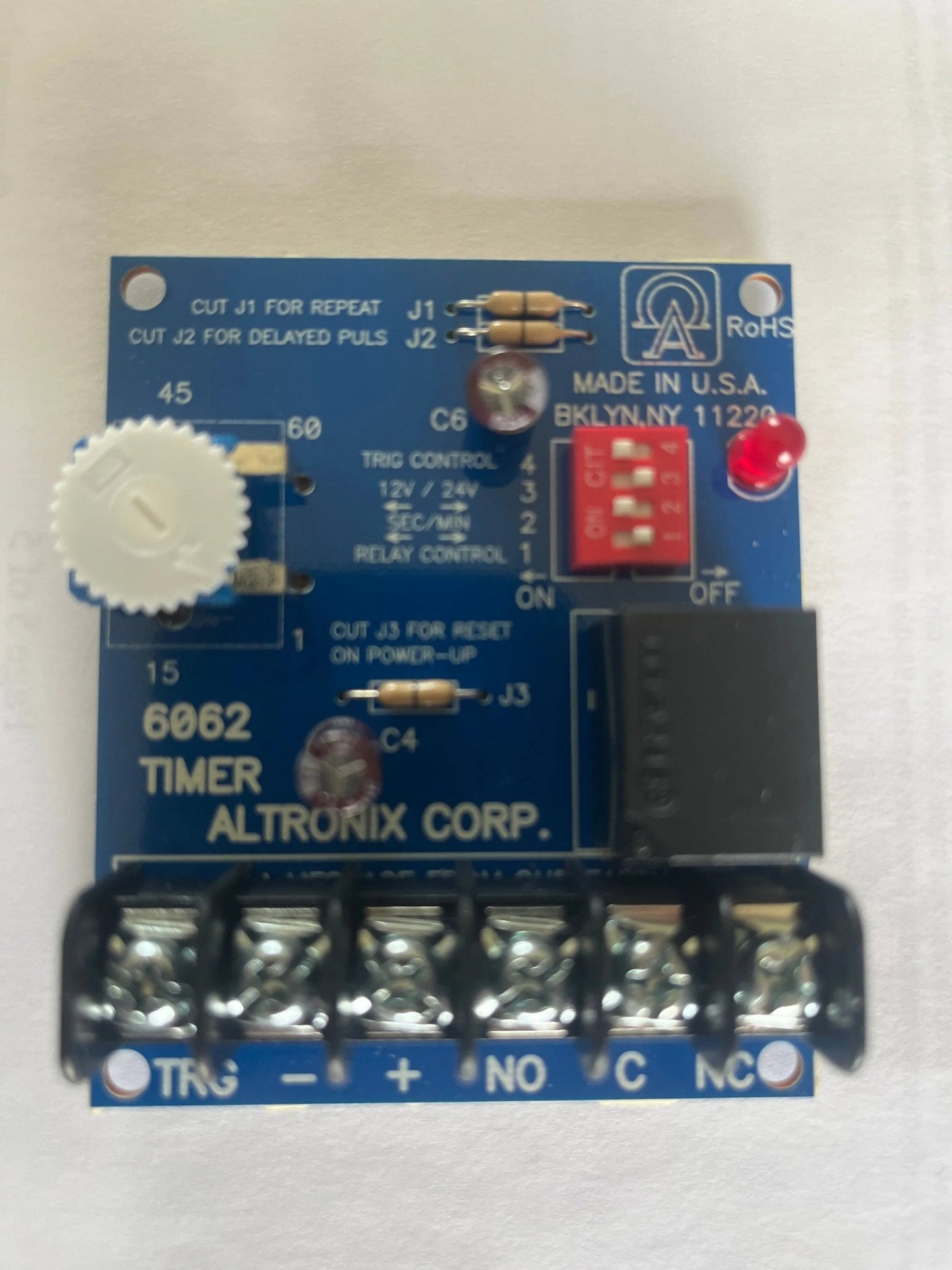 Altronix 6062 multi-purpose adjustable timer module for access control and security applications, delay range from 1 second to 60 minutes.